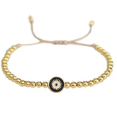 Pulsera de oro negro con ojo malvado