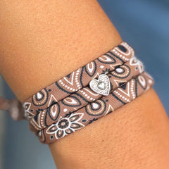 Brown bandana-style bracelet with silver heart