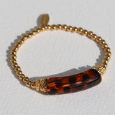 Bracelet fin penne léopard