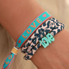 Geweven armbandje love groen oranje