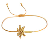 Pulsera de palma de oro