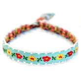 Pulsera tejida flor de algodón azul