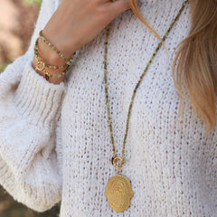 Long collier en grenat vert facetté