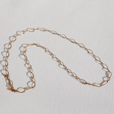 Long oval gold necklace