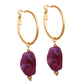Pendientes rocas violeta