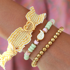 Gelbes Herz-Rüschenarmband