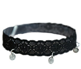 Bracelet de cheville noir avec pièces argentées