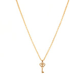 Gold necklace heart key