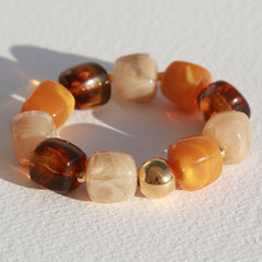 Armband cube golden ball bruin
