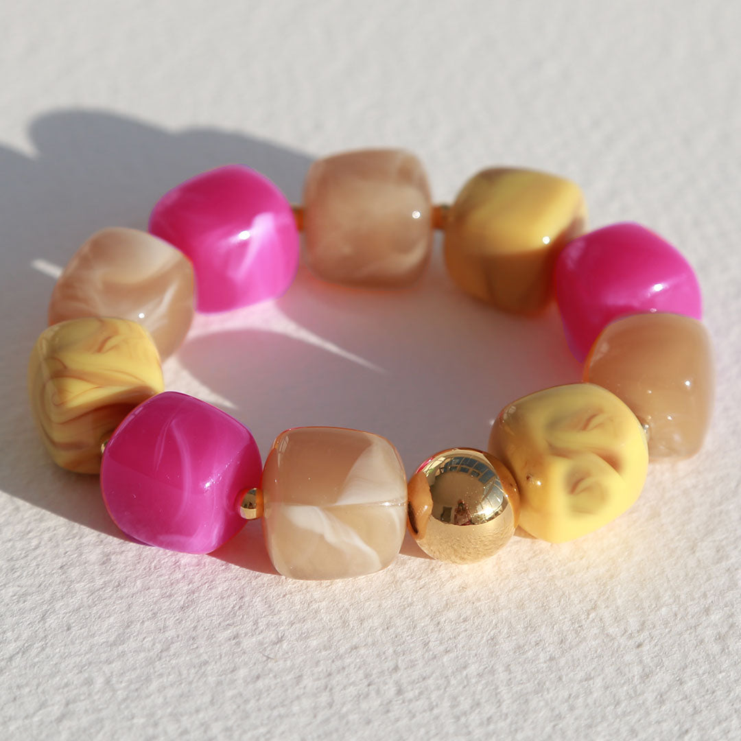 Bracelet cube boule dorée cerise