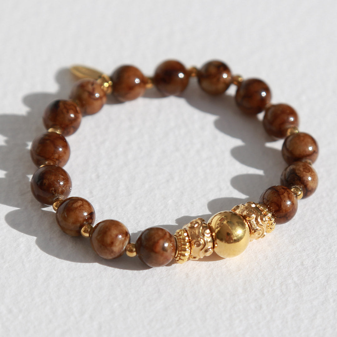Bracelet gold ball brown stone