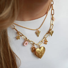 Collier coeur rose métallisé