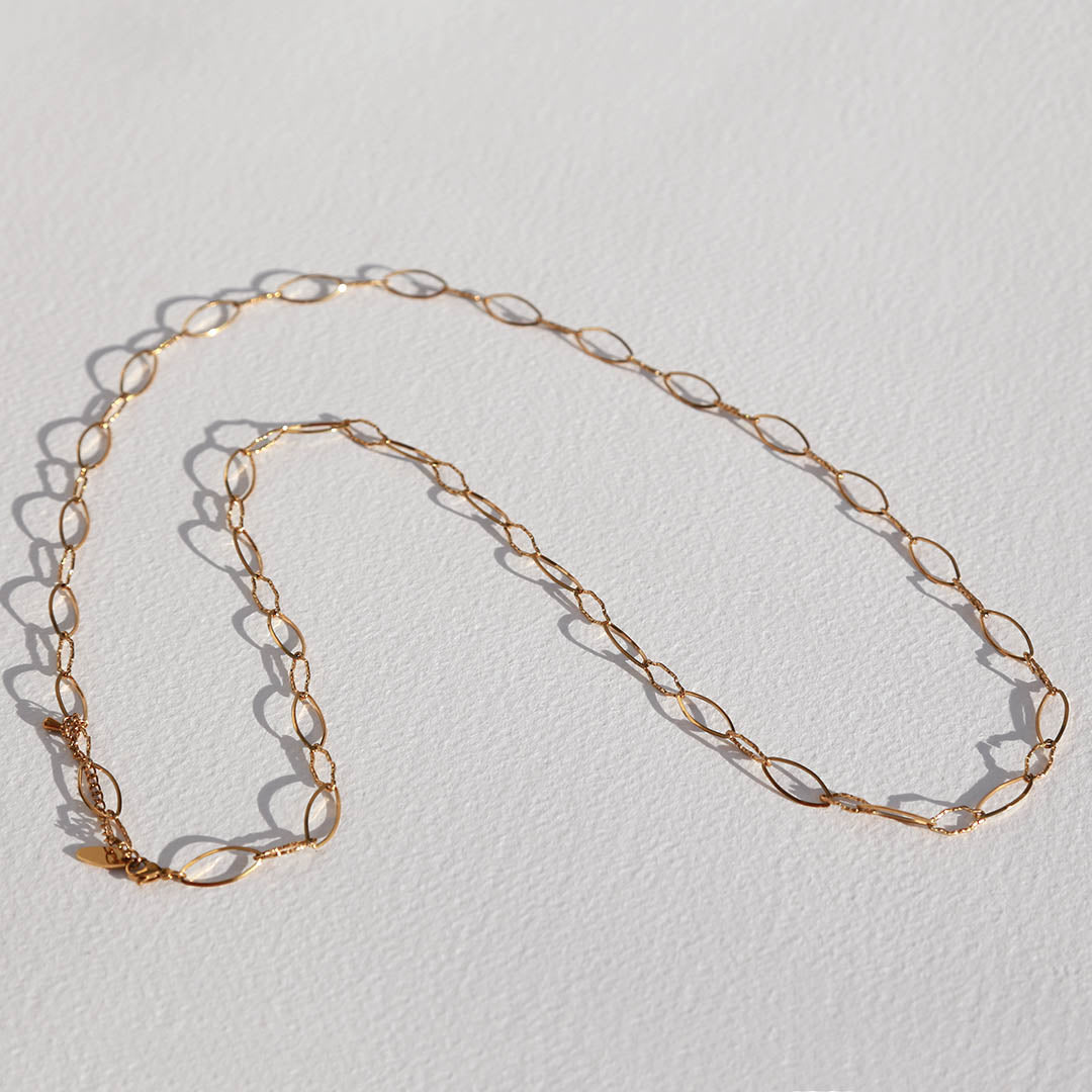Long oval gold necklace