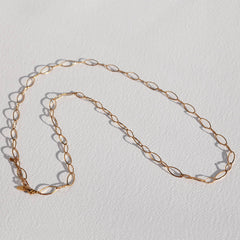 Long oval gold necklace