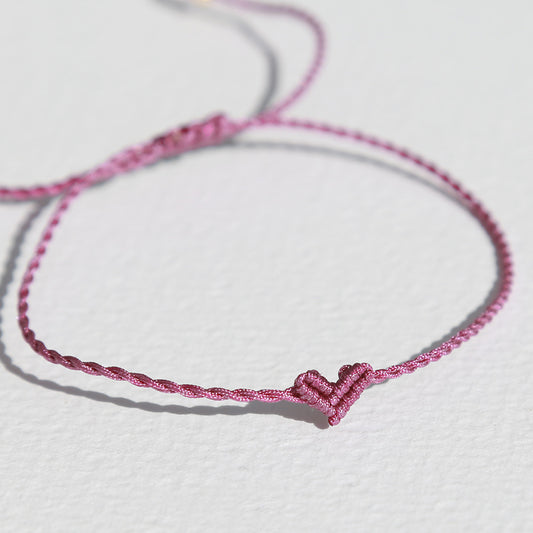 Bracelet petit cœur magenta 1080