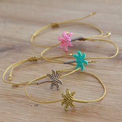Goldenes Palmenarmband