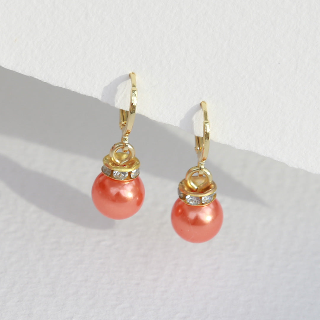 Gouden oorbellen Jingle ball oranje