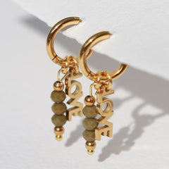 Boucles d'oreilles en or facettées forme olive