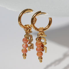 Boucles d'oreilles en or facettes orange