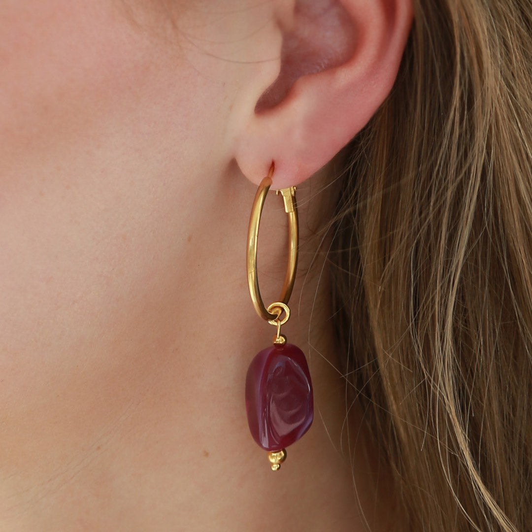 Pendientes rocas violeta