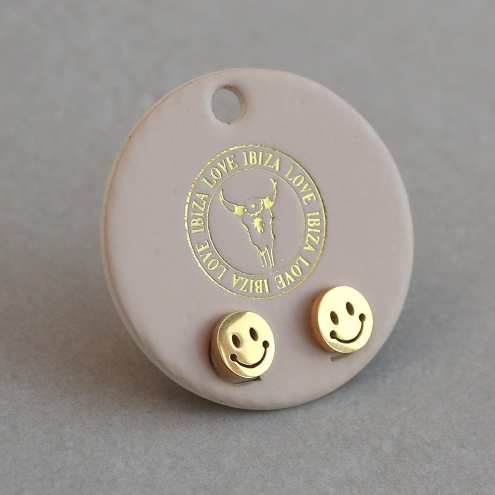 Golden studs smiley