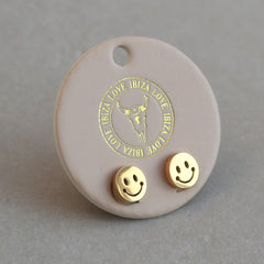 Golden studs smiley