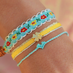 Geweven armband klaver geel
