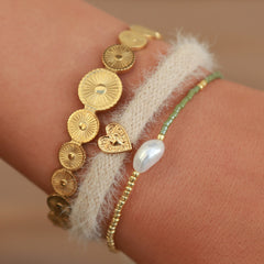 Círculo de brazalete dorado