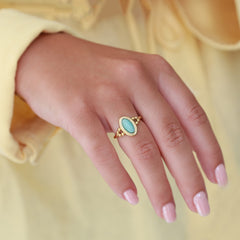 Bague dorée ovale turquoise