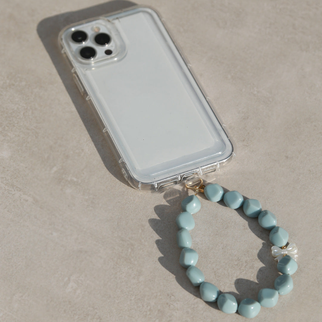 Bijoux de téléphone nœud papillon bleu perle