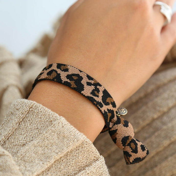 Geweven armbandje luipaard bruin