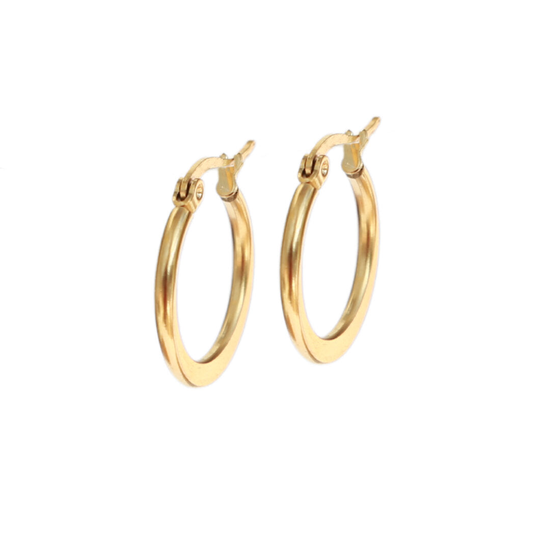 Gold earrings circle statement